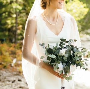Ivory fingertip length veil with pearls